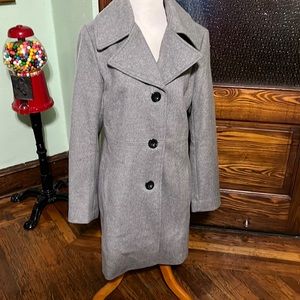 Wool blend button up coat.